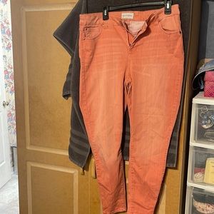 Skinny ankle peachy color jeans, well loved and worn, button has worn off metal